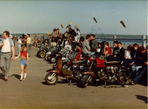 A girl looks on at Mod revivalists in Tramore in 1982. Source: irishjacks80s.web.com